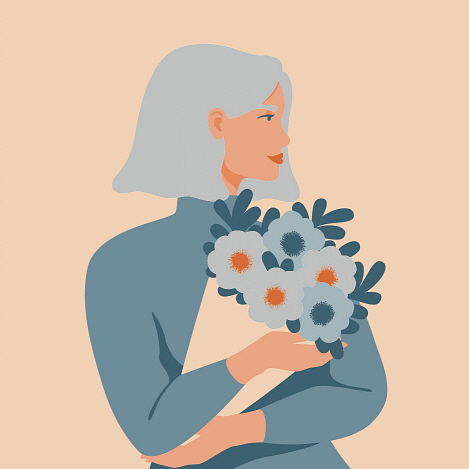 Premium A woman holding flowers